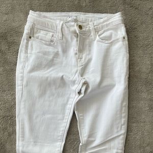 White straight legged Frame Garçon jeans.